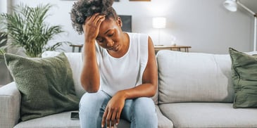 sad woman feeling like a victim after trauma