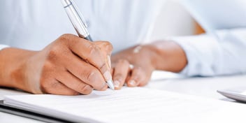 man completing his service of petition and summons paperwork