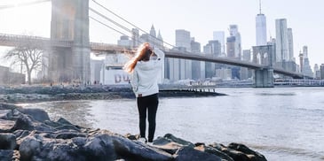woman taking a walk as a self-care break from working in the city